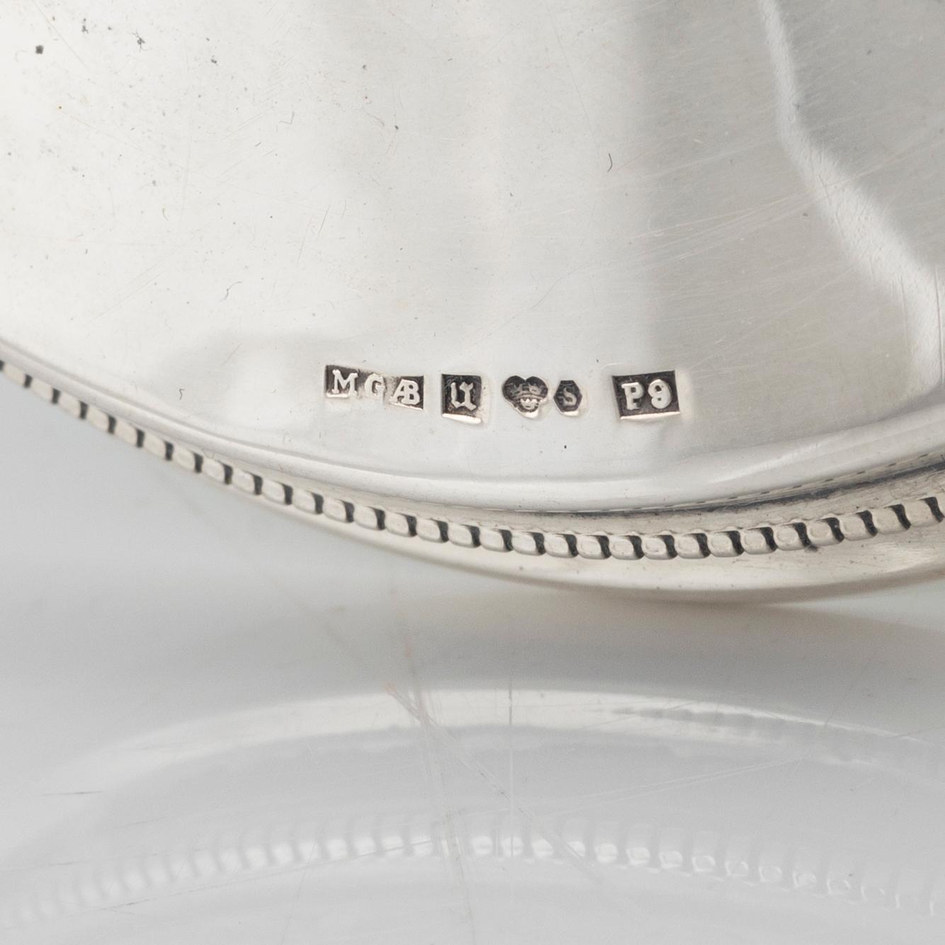 A pair of silver candle sticks, MGAB, Uppsala, Sweden, 1965.