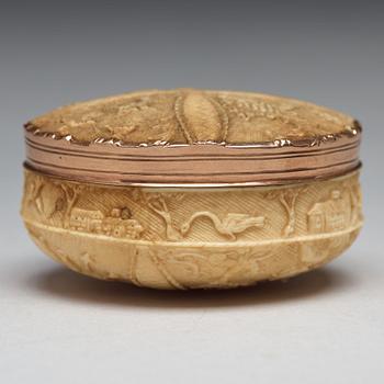 A 17th century bone and gold snuff-box.