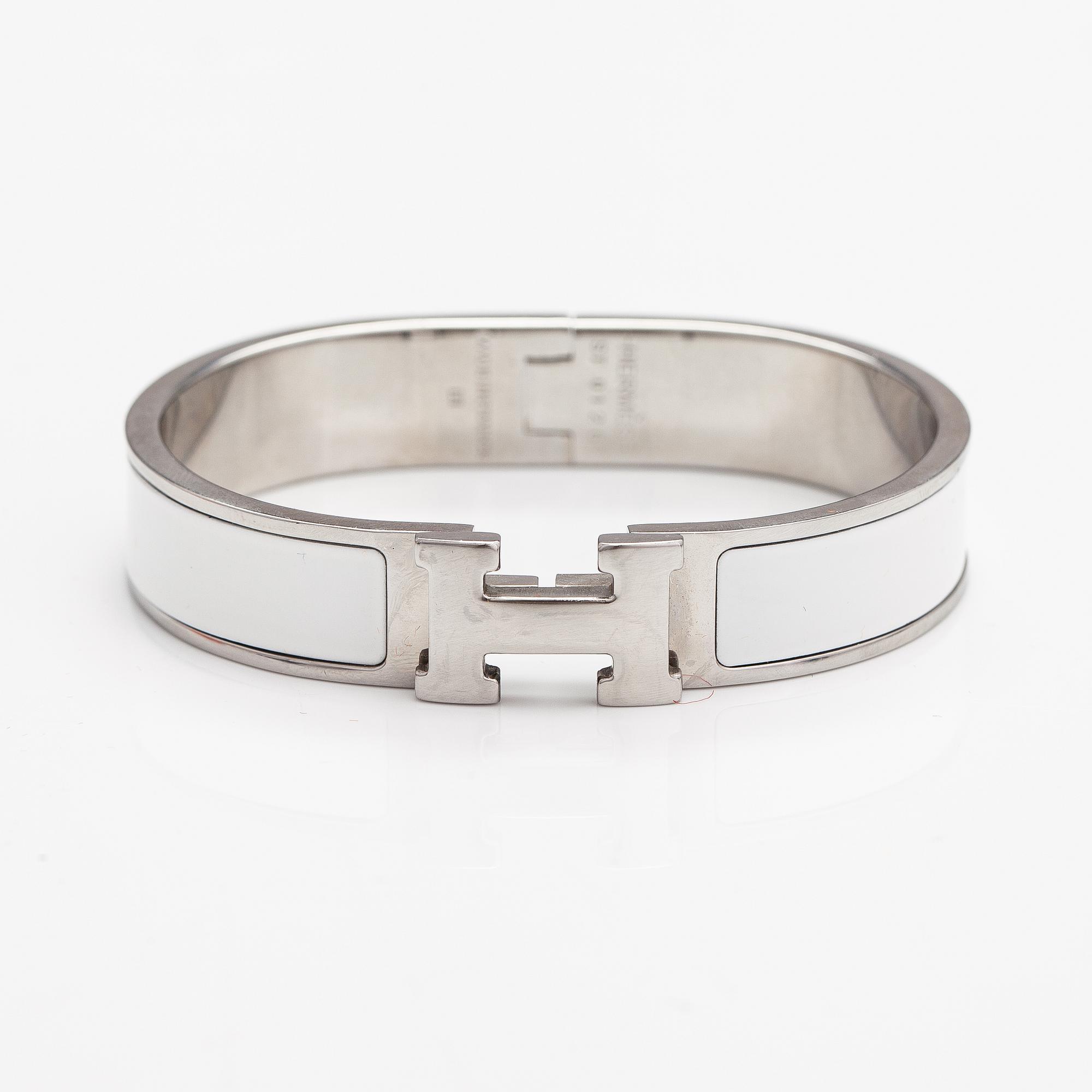 Hermès, armband, "Clic H PM", silverfärgad metall och vit emalj.