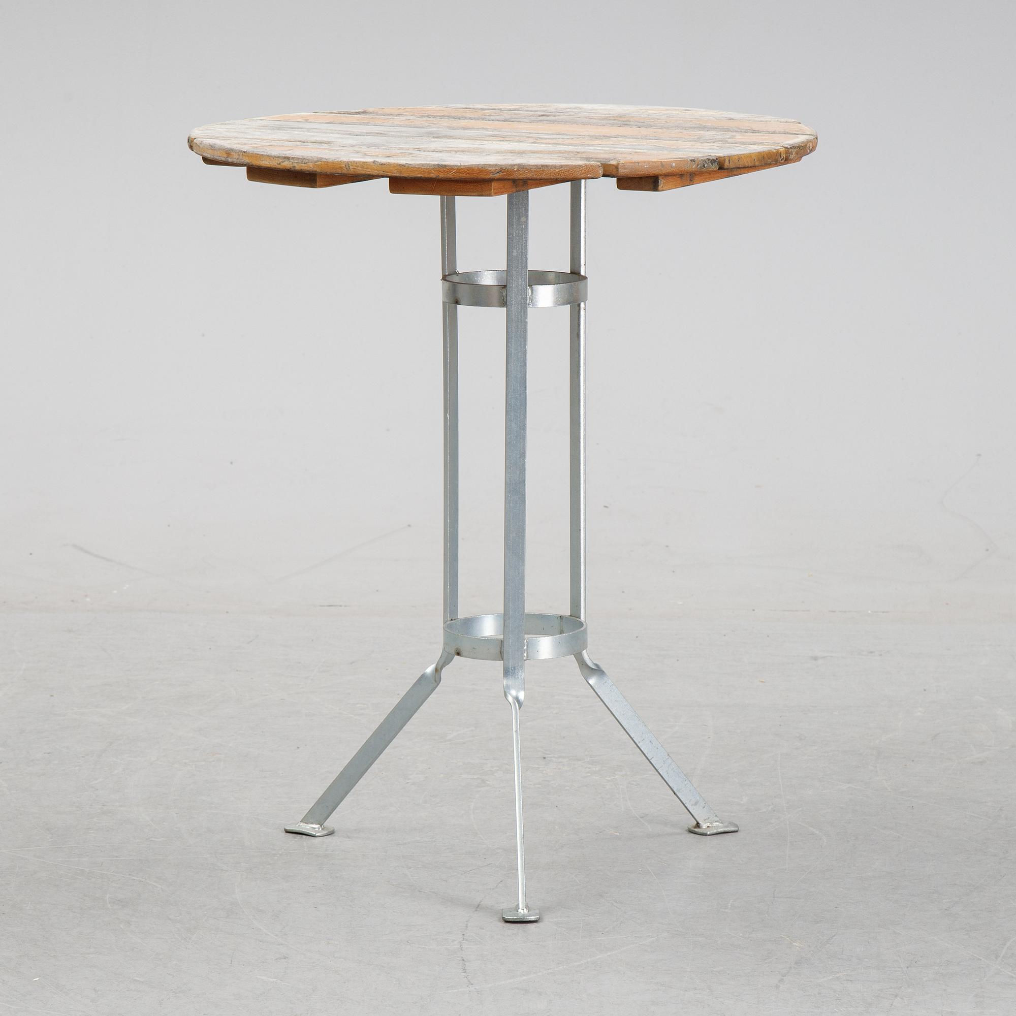 A set of four chairs and one table, Grythyttan, late 20th century.