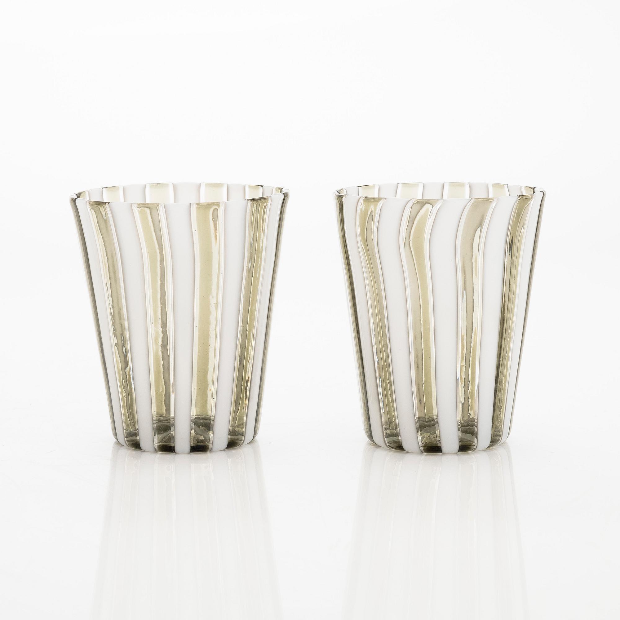 Gio Ponti, a glass bottle '4500' signed Venini, Murano and three drinking glasses, Italy.