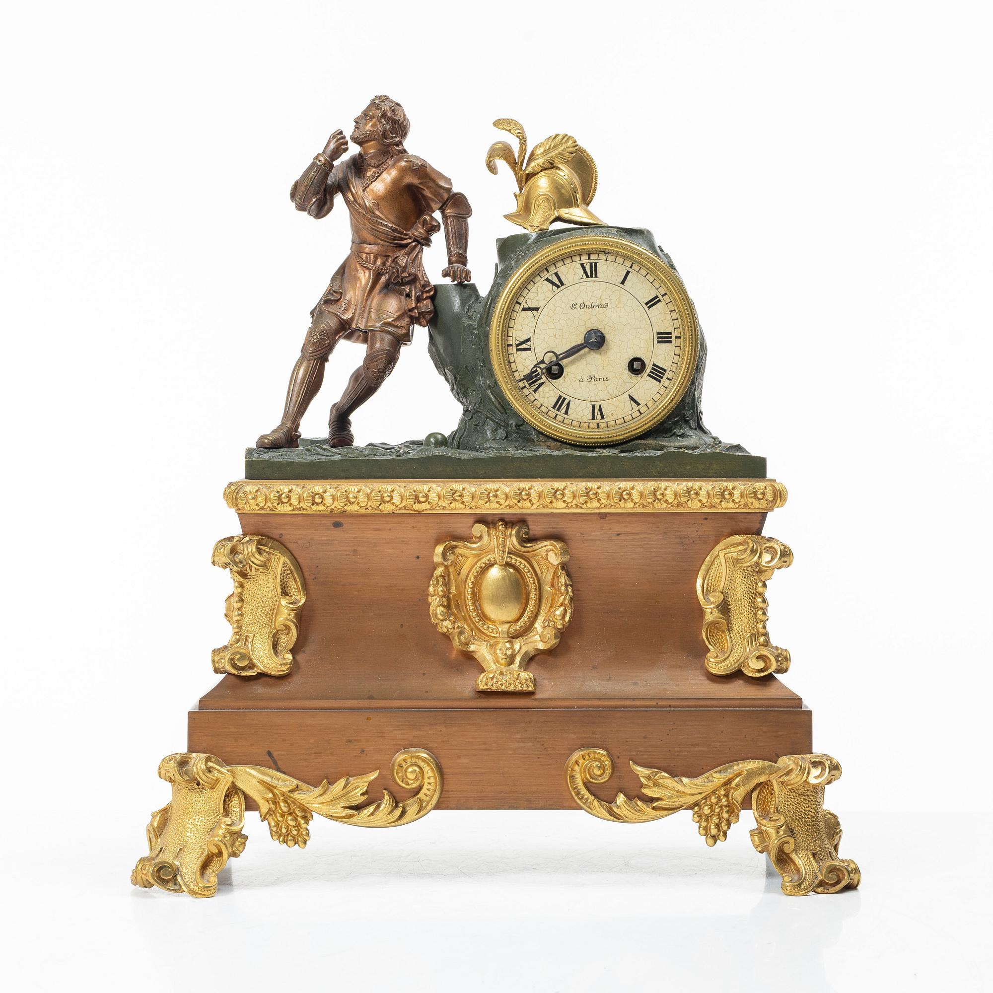 A mantel clock, France, early 20th Century.