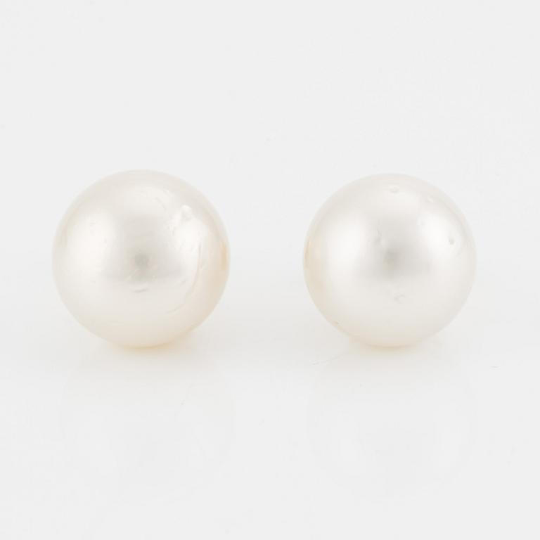 Earrings with cultured South Sea pearls.