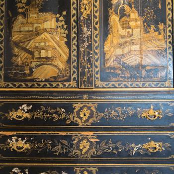 An early 18th century Chinese style cupboard.