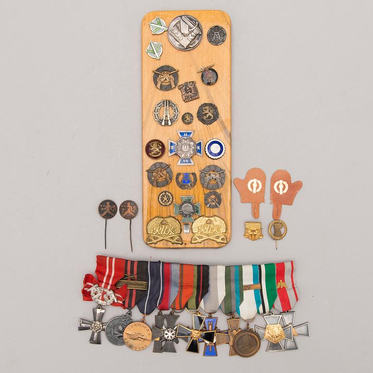 A set of Finnish badges and medals, first to second half of 20th Century.
