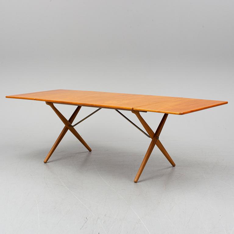 HANS J WEGNER, a teak and oak drop-leaf dining table, Andreas Tuck, Denmark 1950'-60's.