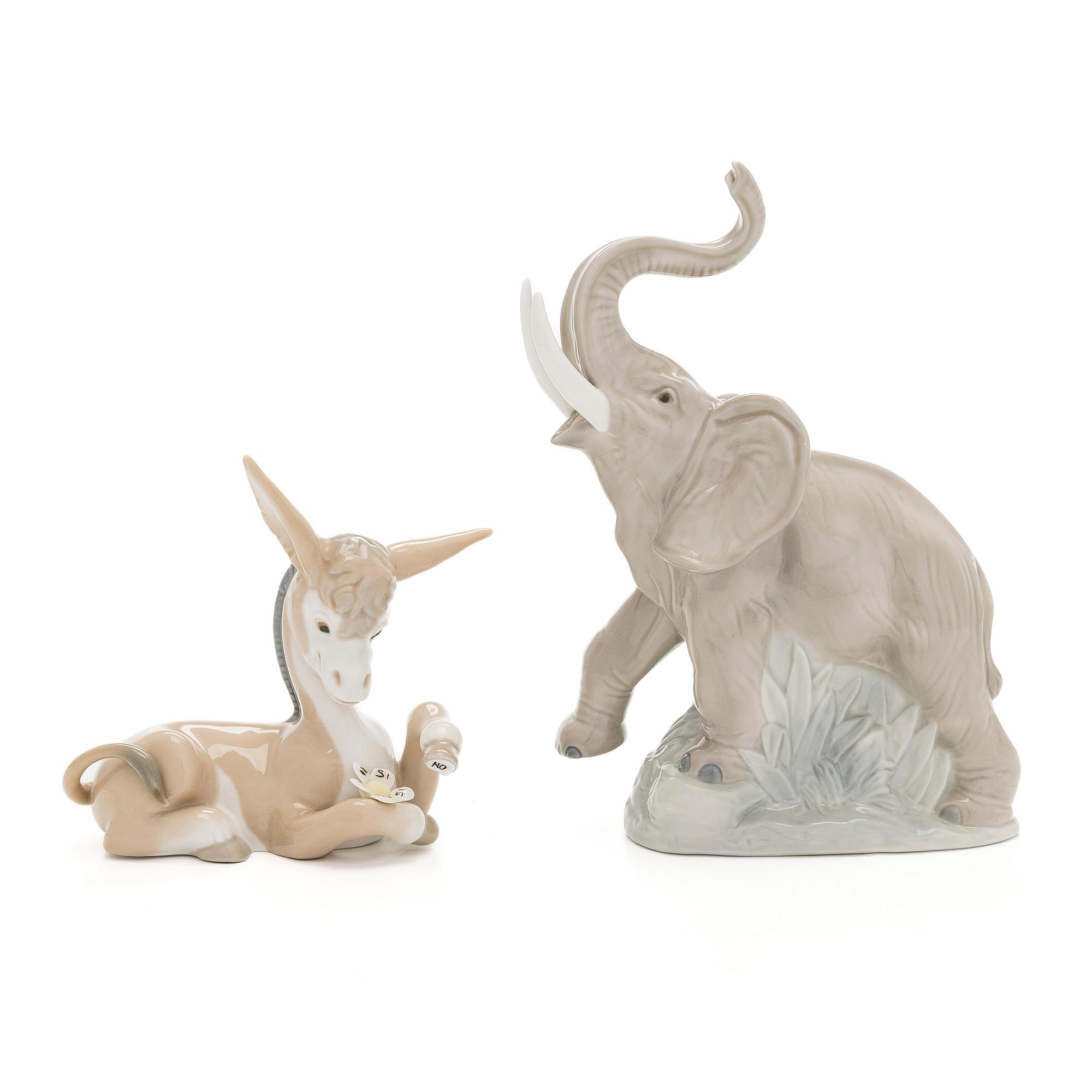 Lladró, two porcelain figurines, Donkey in Love and Trumpeting Elephant.