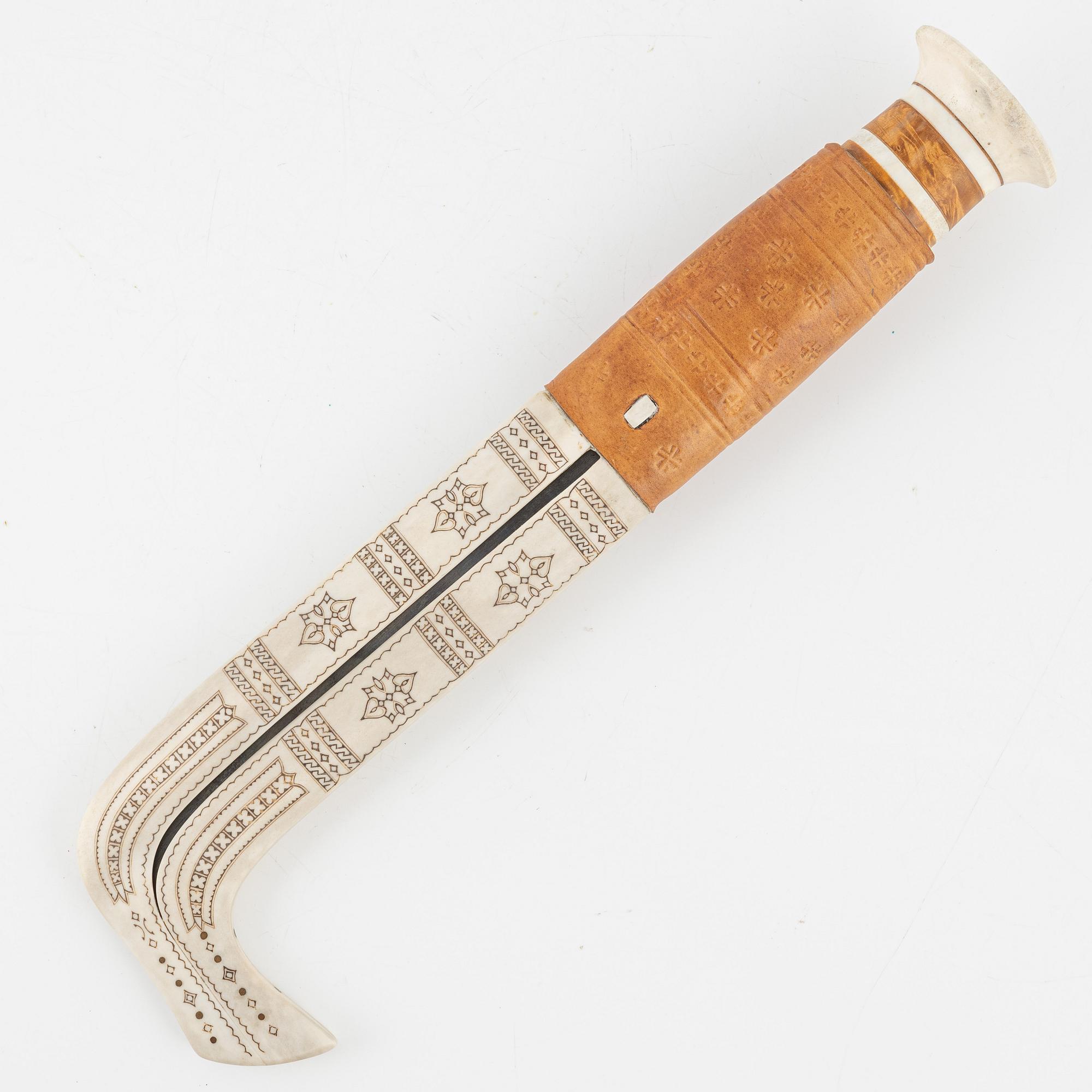 Knut Sunna, a large reindeer horn knife. signed and dated 1982.