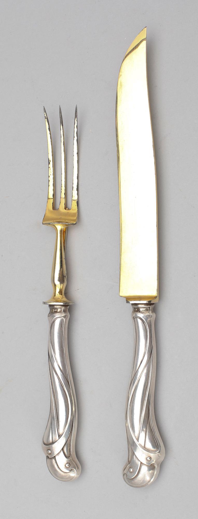 UPPLÄGGNINGSBESTICK, 2 st, silver, jugend, sannolikt Frankrike, 1900-tal.