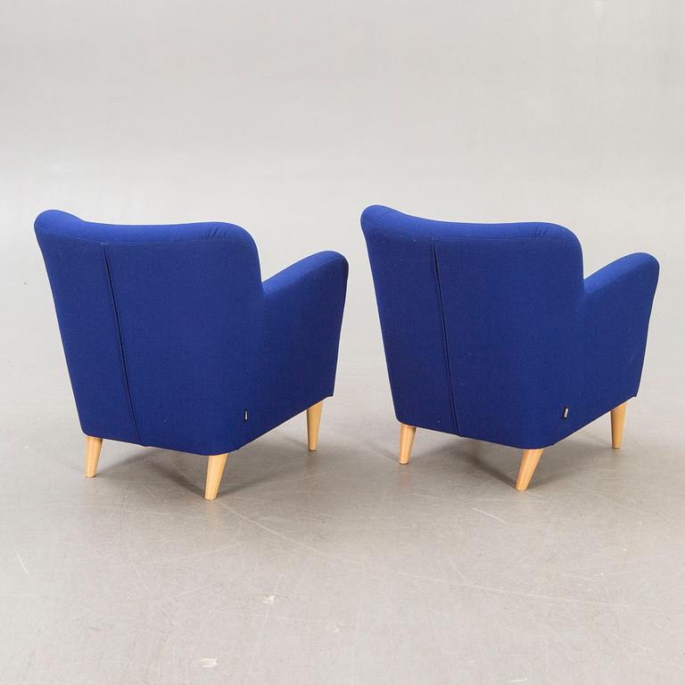 A pair of Swedese Nova 21st century easy chairs.