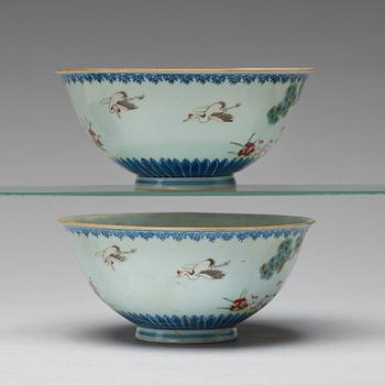 A pair of famille rose bowls, late Qing dynasty, with Qianlong mark.