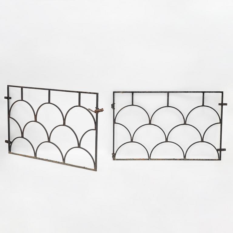 A pair of cast iron gates, 1930's.
