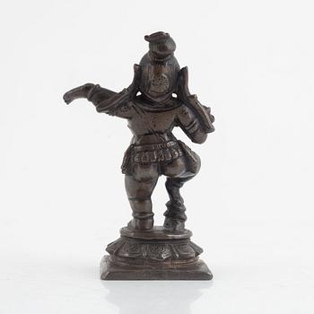 A small bronze figure of Krishna, Southern India, 16th/ 17th century.