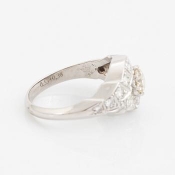 Brilliant-cut light brown diamond ring.
