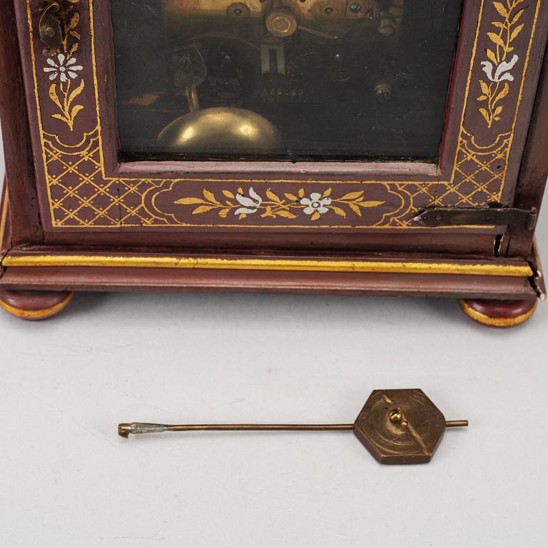 An 18th century table clock.