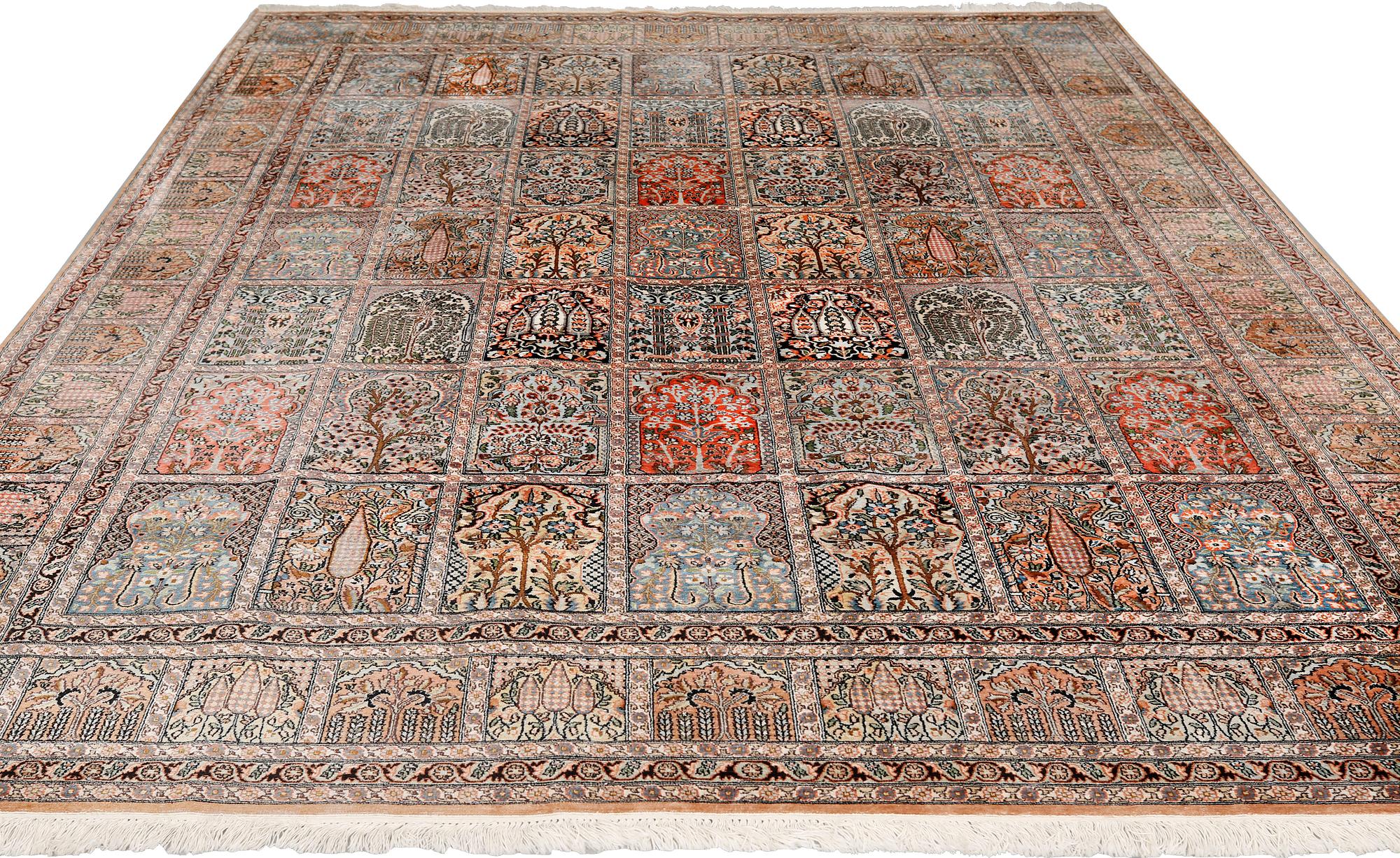 A silk Kashmir carpet, approx. 327 x 243 cm.