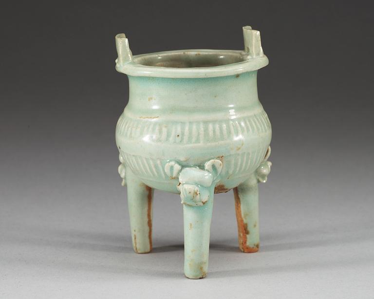 A pale celadon glazed tripod censer, Yuan dynasty (1271-1368).