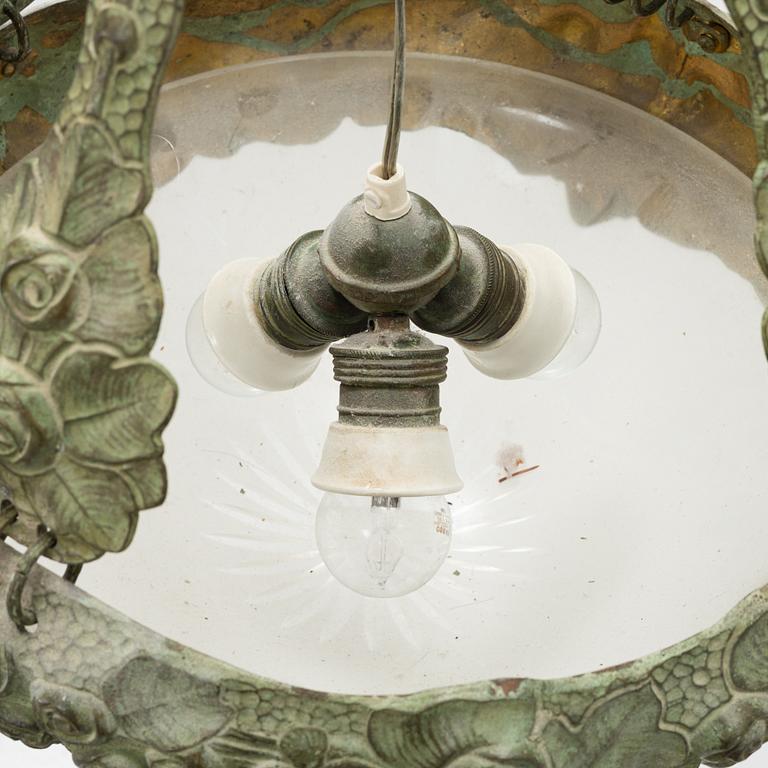 Alice Nordin, taklampa, jugend, patinerad brons, omkring 1900.