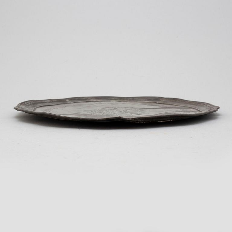 A GERMAN PEWTER PLATE, marked 1710.