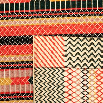 Quilt, Scania circa 1900, composed of two stitched panels, 169x137 cm, signed.