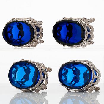 A set of four French silver and blue glass salt-cellars, mark of GA Jacob, Paris 1778.