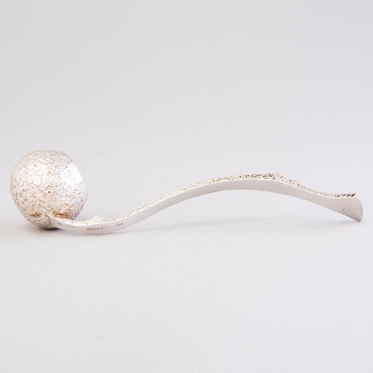 PEKKA TURTIAINEN, An 8-piece silver punch set, Helsinki 1978.