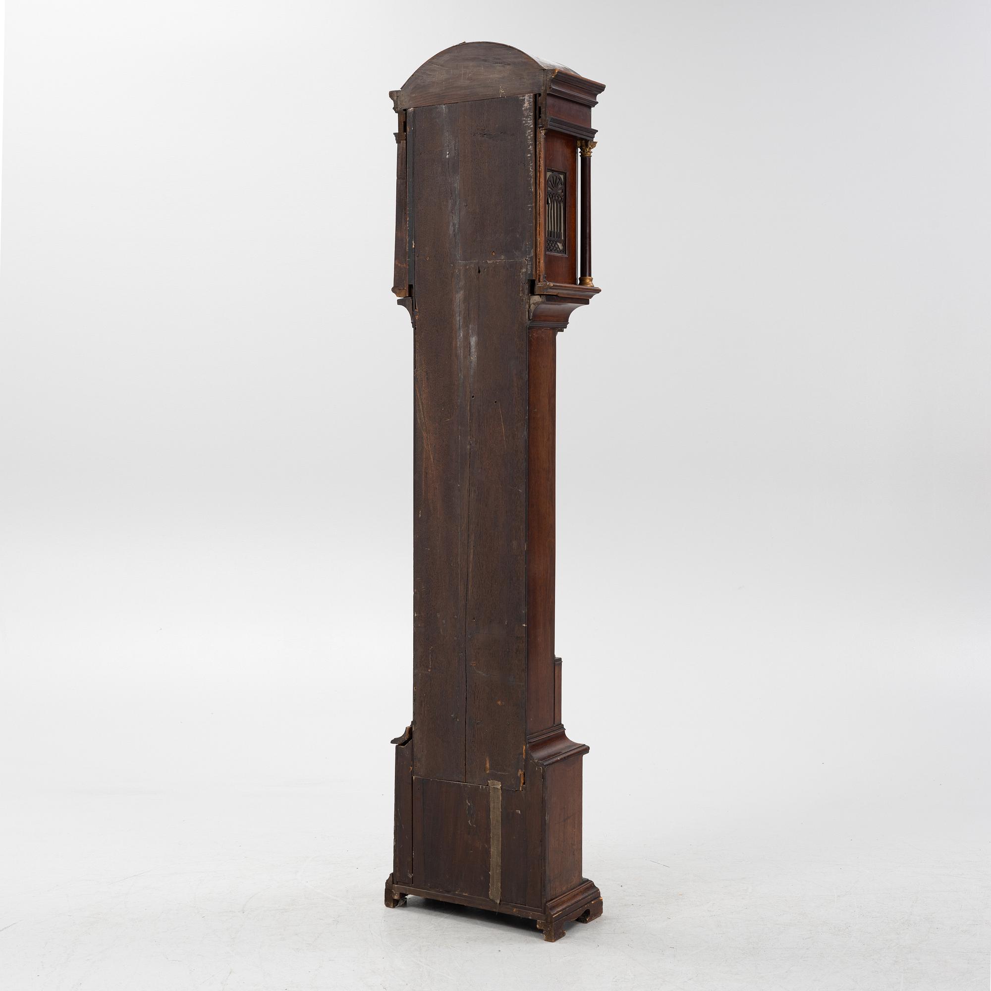 A mahogany veneered longcase clock, marked Peter Pohlmann, London, England, 18th century.