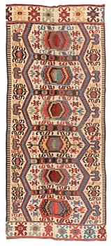 An antique central Anatolian kilim, possibly Konya, c. 339 x 140 cm.