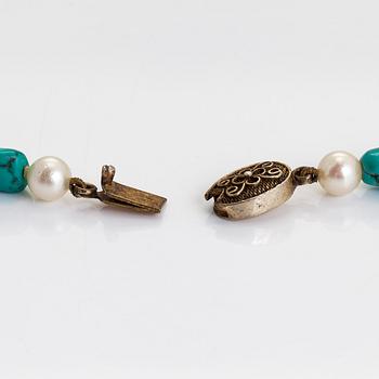 A cultured pearl and turquoise necklace.