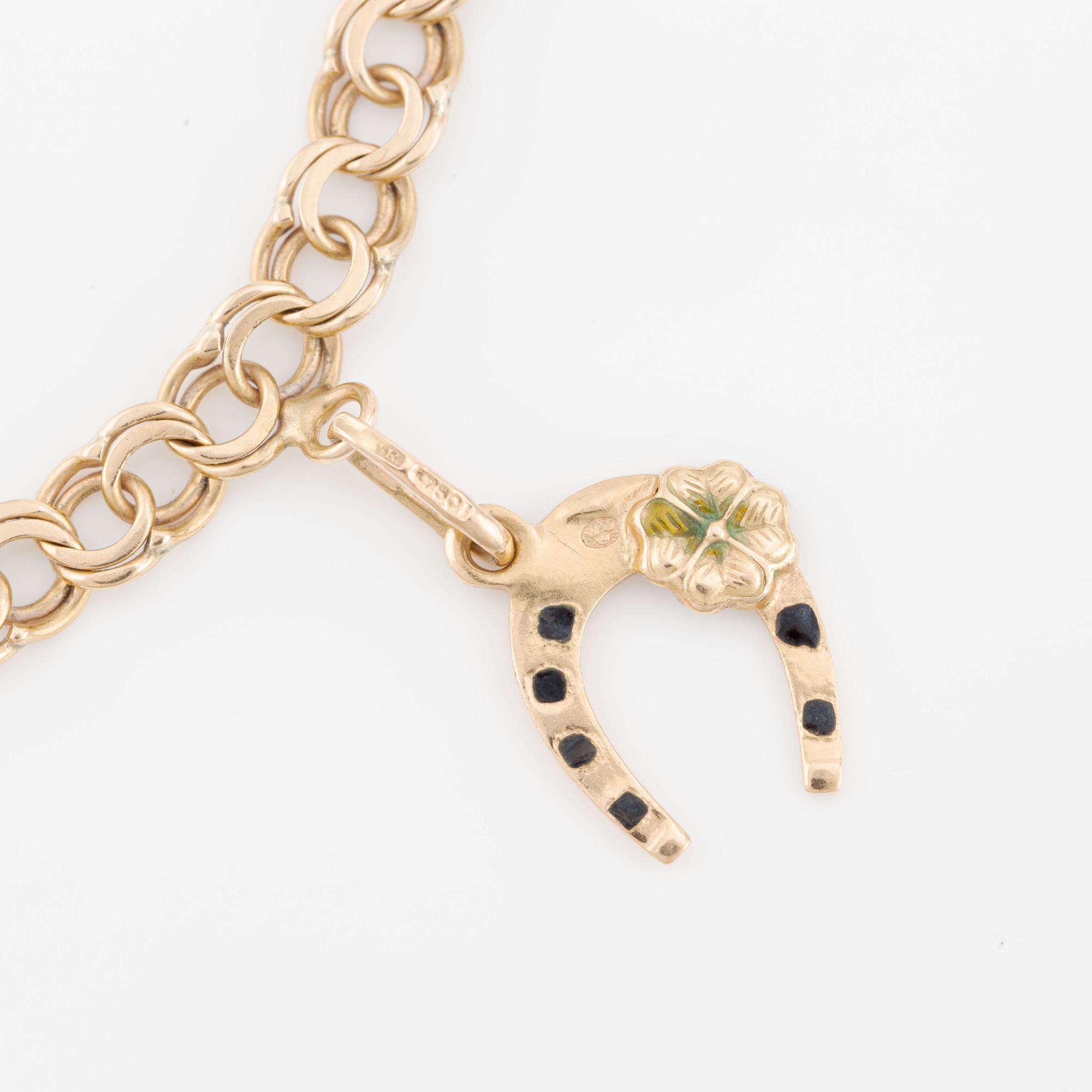 Armband, 18K guld med berlocker.