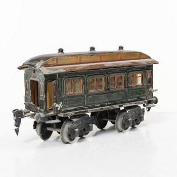 Model train with track and station building, 13 pieces, Germany, 1920s.