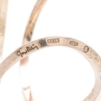 A silver ring and bracelet "loop cuff" by Efva Attling.