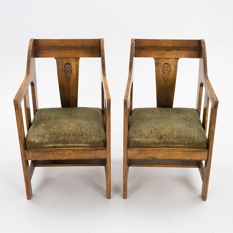 Carl Westman, probably, a pair of stained birch Art Nouveau easy chairs, Sweden ca 1900.