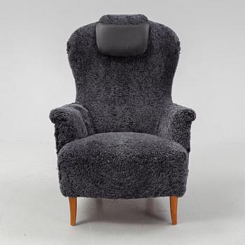 Carl Malmsten, a shearling upholstered 'Farmor' lounge chair from Oh Sjögren.