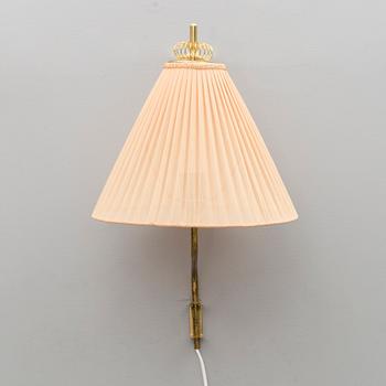 A mid 20th century wall light marked Idman, Finland.