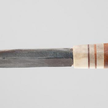 Olof Tomas Svonni, a reindeer horn knife, signed.