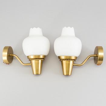 A pair of brass wall lights, mid 20th Century.