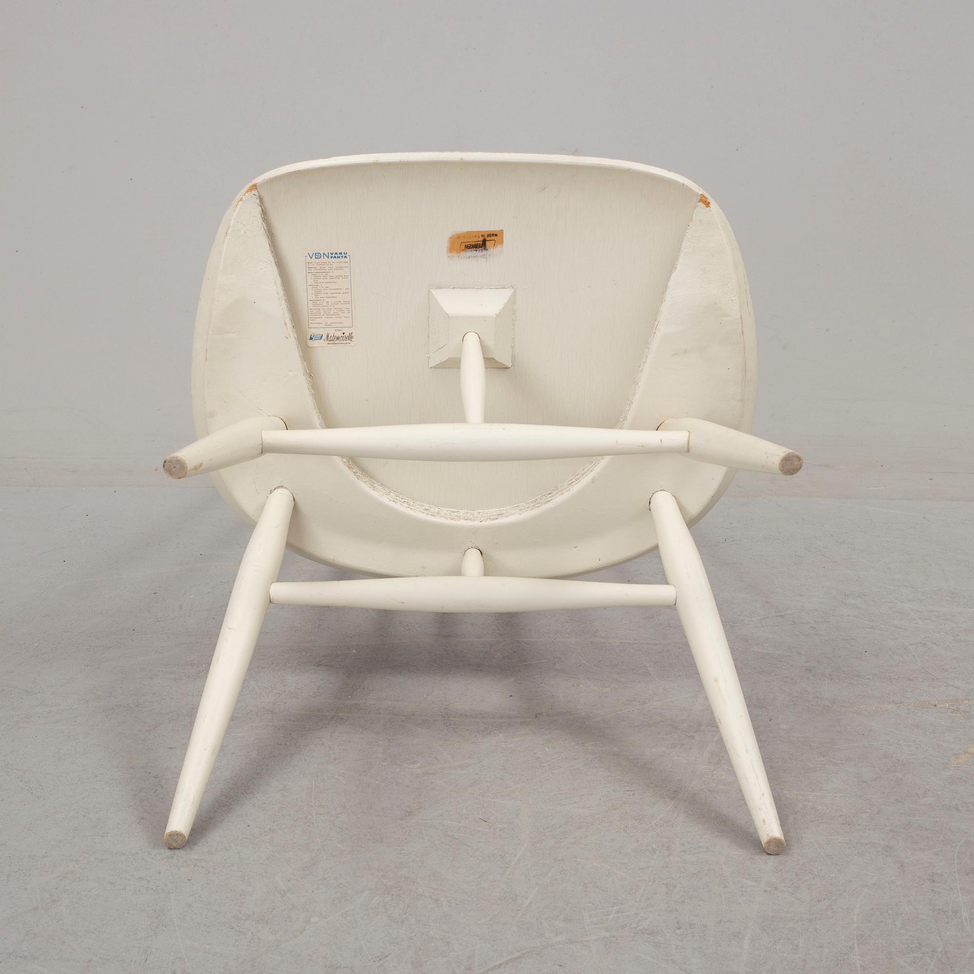 A second half of the 20th century 'mademoiselle' chair by Ilmari Tapiovaara.