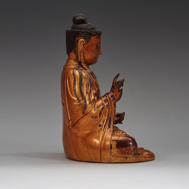 A dry gilt lacquered figure of buddha, Ming dynasty (1368-1644).