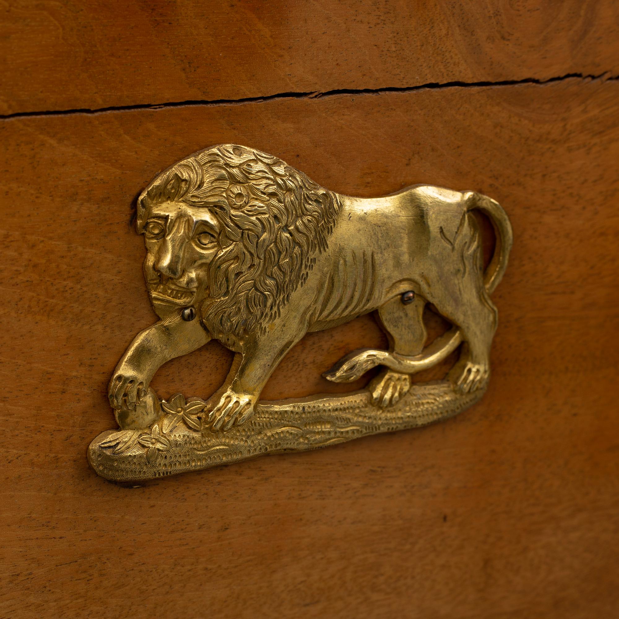 A northern european empire chiffonier, first half of the 19th century.
