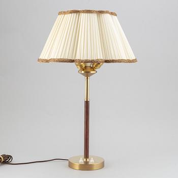 A brass and leather table lamp by Bertil Brisborg from Nordiska kompaniet, model no. 2043, 1940's/50's.