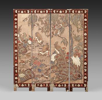 360. A coromandel black-lacquer four panel screen, Qing Dynasty (1644-1912).