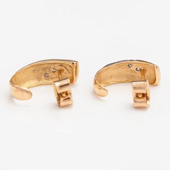 A pair of 14K ogld earrings with diaomnds ca. 0.036 ct in total. Finland 1992.