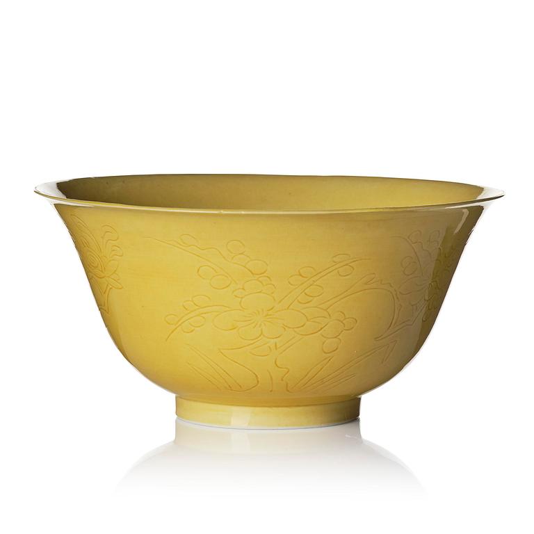A yellow glazed 'prunus' bowl, Qing dynasty, 18th century.