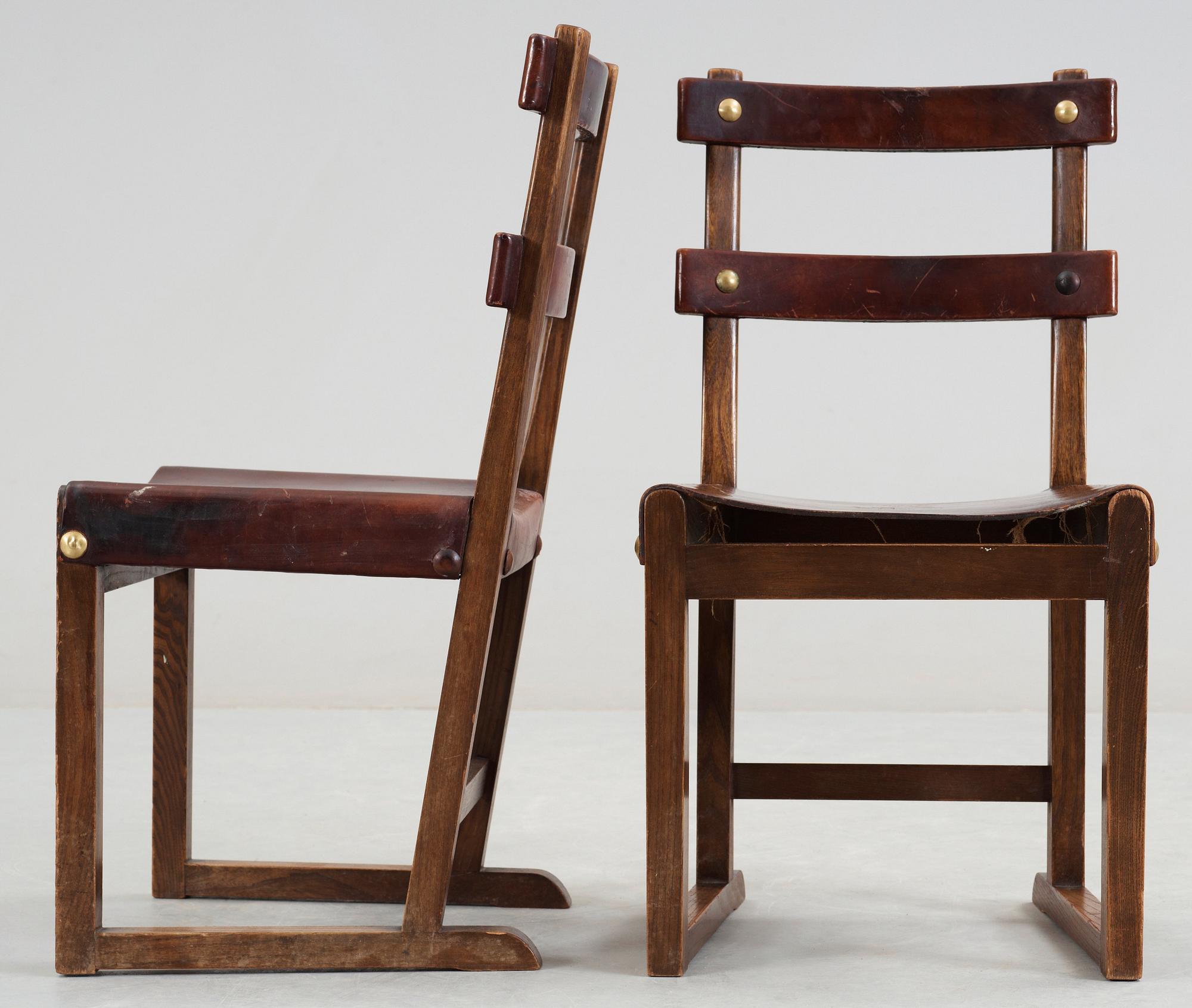 A set of five Axel Einar Hjorth 'Funkis' brown leather and stained wood chairs, Nordiska Kompaniet, Sweden ca 1930.