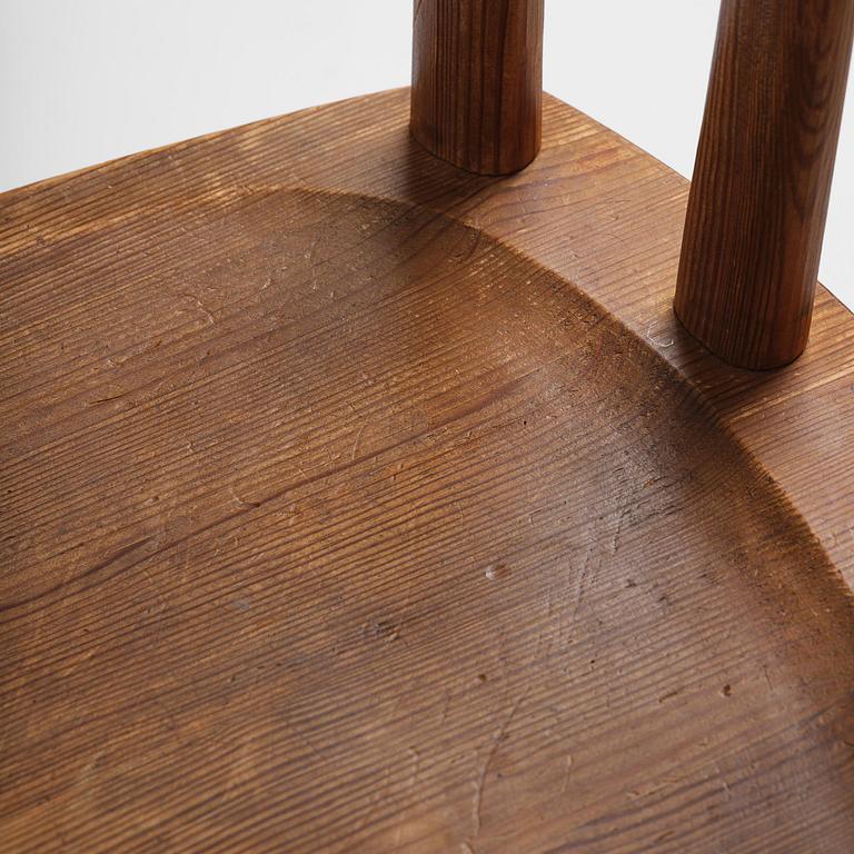 Axel Einar Hjorth, a set of six stained pine "Utö" chairs, Nordiska Kompaniet, Sweden, 1930s.