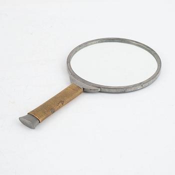 Estrid Ericson & Björn Trägårdh, a pewter and brass hand mirror, model "A 1444", Svenskt Tenn, Sweden 1930s-40s.