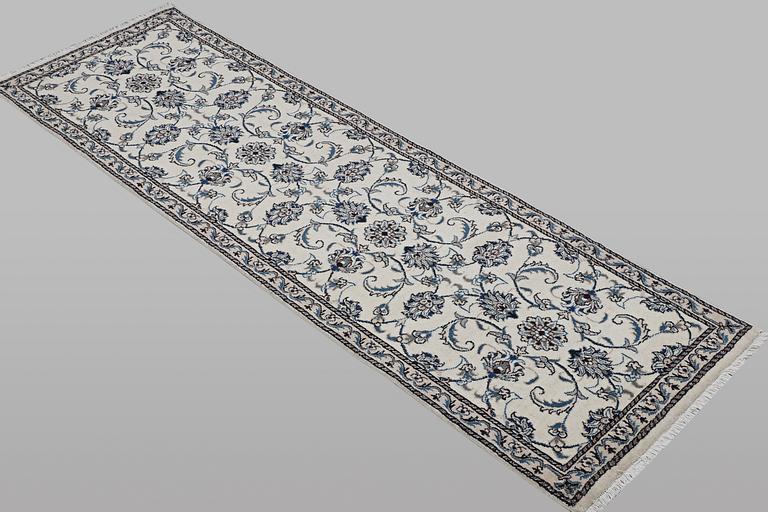 A runner carpet, Nain, part silk, ca 248 x 72 cm.