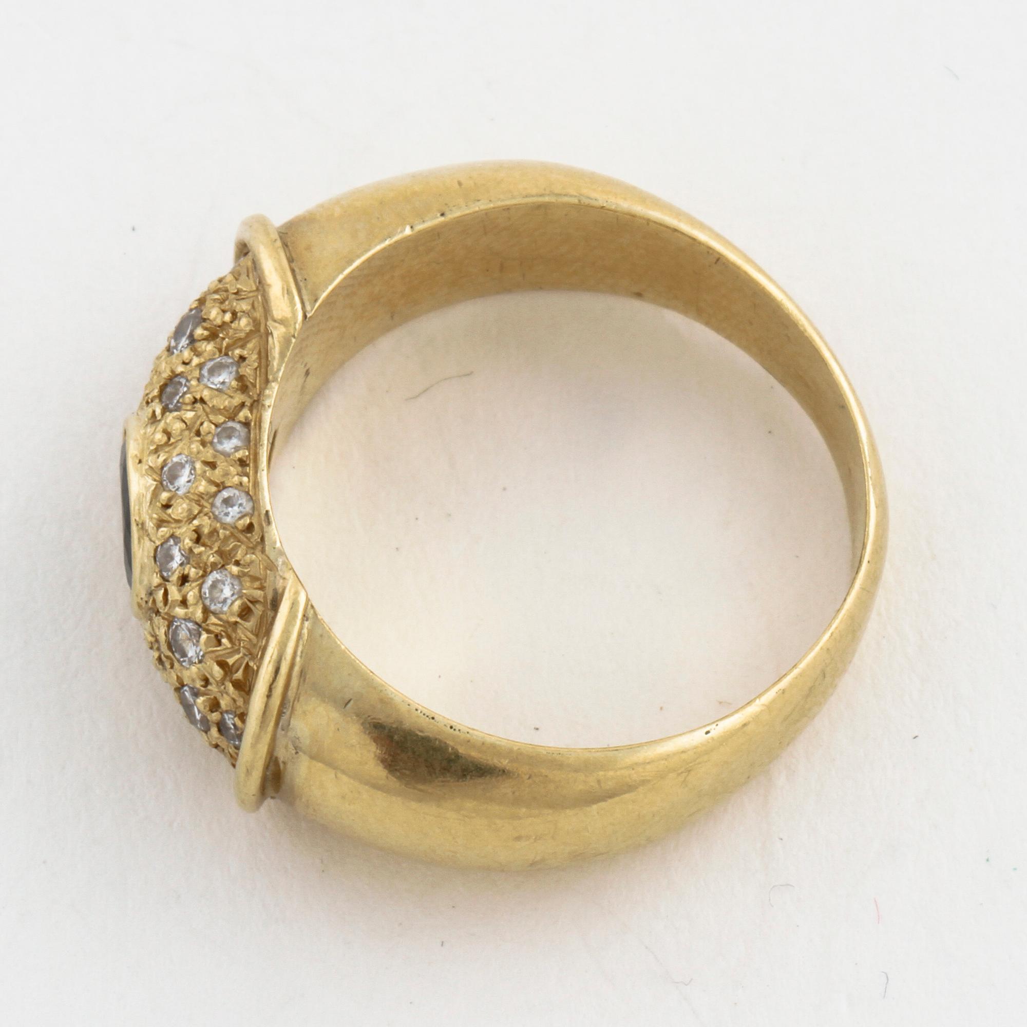 A sapphire and brilliant cut diamond ring.