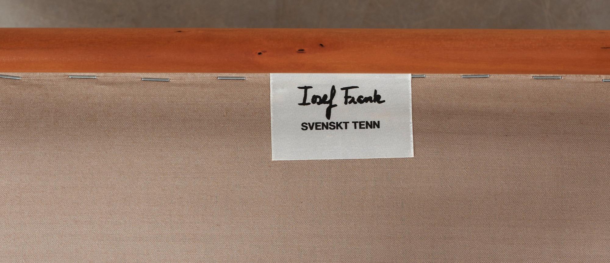 A Josef Frank cherry and yellow leather armchair, Svenskt Tenn, model 652.